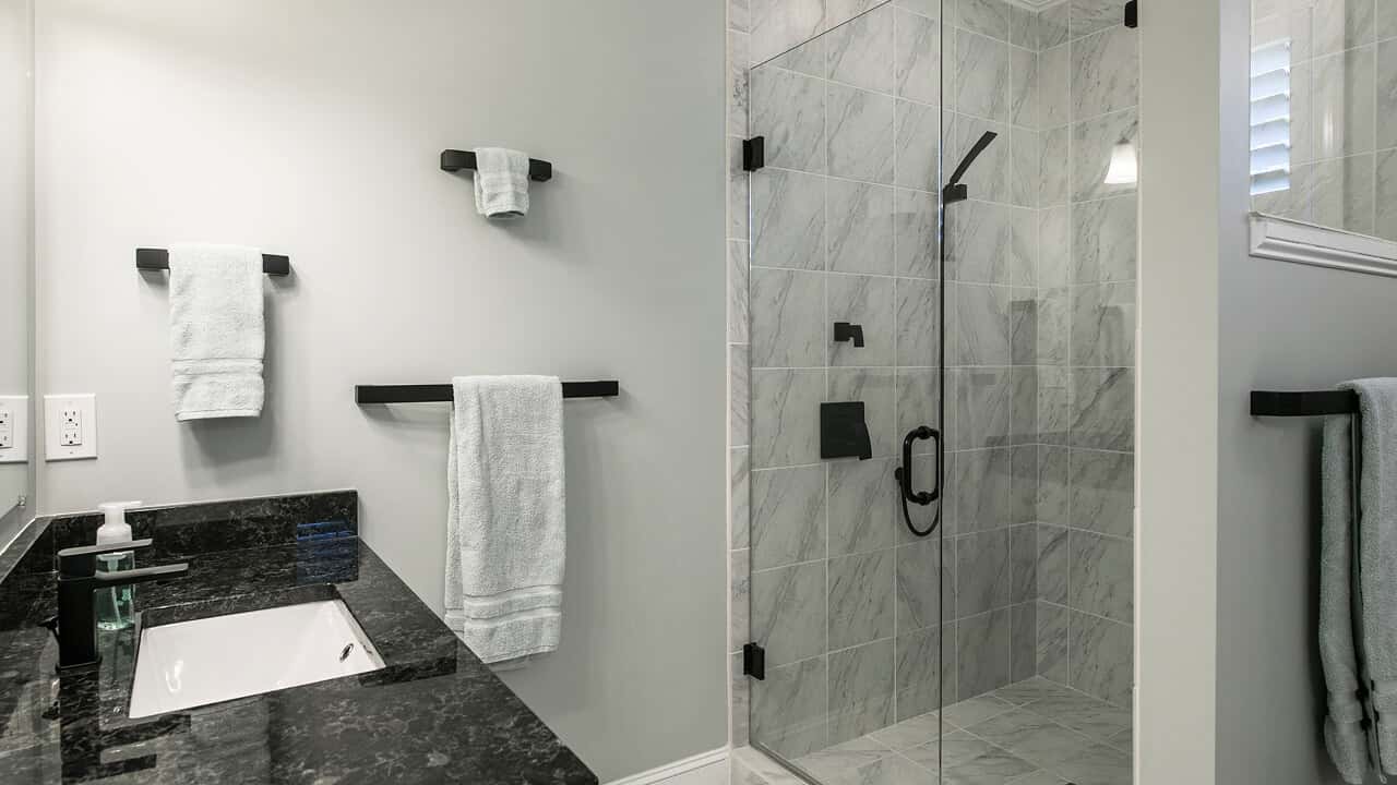 Bathroom remodel with new tile and fixtures